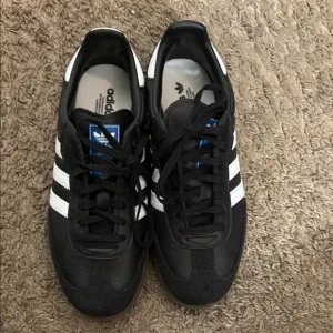 Adidas kid’s Black and White Samba, brand new never worn.