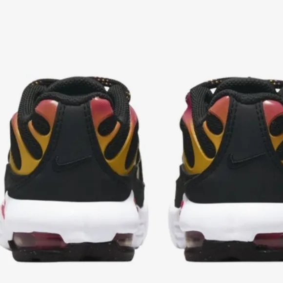 Nike Black and Pink Sneakers with Sporty Design