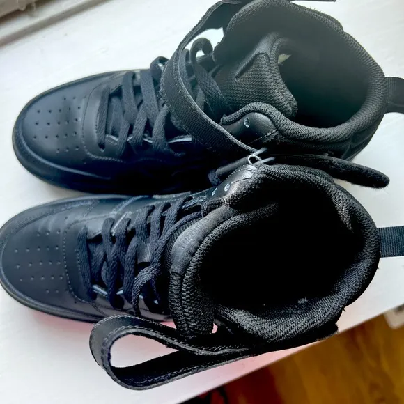 Nike black high tops, sz 5 youth, never worn.