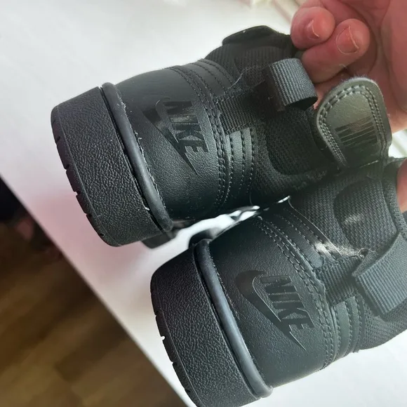 Nike black high tops, sz 5 youth, never worn.