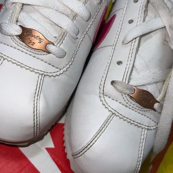Nike girl White and Pink Cortez sneakers