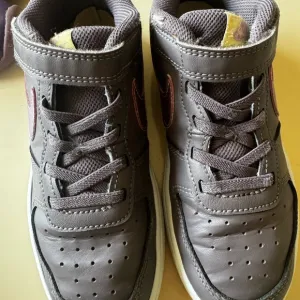 Nike purple and pink, leather lace, and Velcro girls sneakers
